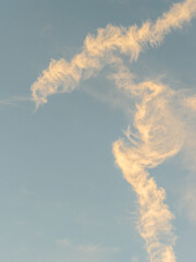 Clean abstract wallpaper background with golden clouds and light blue sky gradient