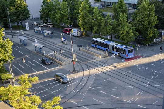View from above of a road junction with tram stop and public bus, Stiglmaierplatz, Munich, Upper Bavaria, Bavaria, Germany