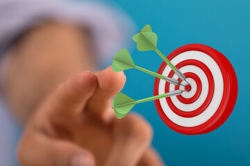 Concept of success and accuracy with darts hitting a target. Metaphor for goal achievement. Ideal for business, strategy, and success.