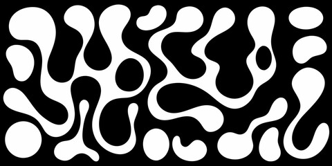 Abstract organic shapes in black and white creating a flowing liquid pattern background