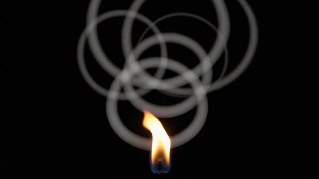 Mesmerizing Flame Emits Expanding Smoke Rings in Slow Motion - Powered by Adobe