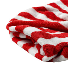 Close up of a red and white striped towel folded neatly