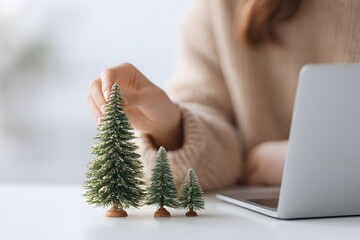 Hand Decorating Desk with Miniature Christmas Trees