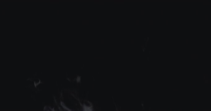 Smoke-like special effects against a black background