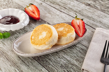 Cottage cheese pancakes - Syrniki for breakfast