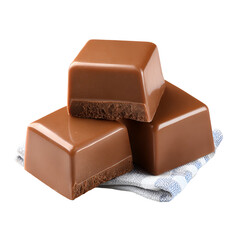 Three rich milk chocolate squares stacked on a napkin