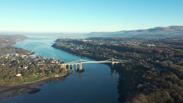 Aerial view of Britannia and Menai bridges in Wales over the Menai strait on a sunny day