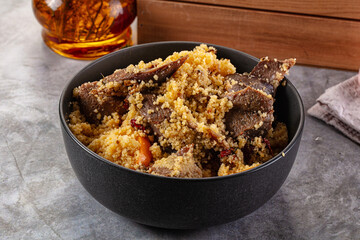 Traditional couscous with lamb and vegetables