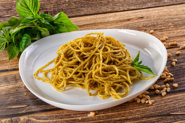 Italian green pasta with pesto sauce
