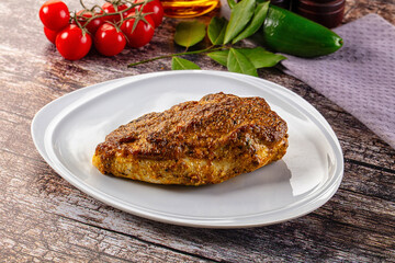 Baked chicken breast with spices and herbs