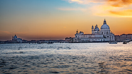 The photograph depicts St Mark's Square (Piazza San Marco) in Venice. Dominating the square is the bell tower (Campanile di San Marco)