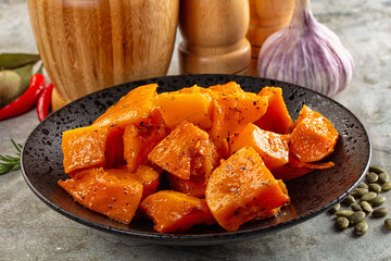 Vegan cuisine - baked pumpkin with herbs