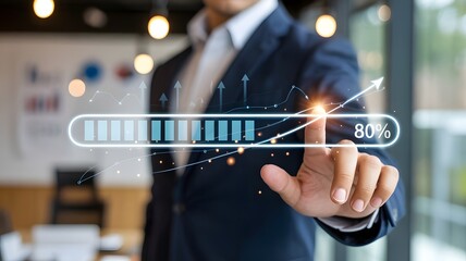 A person in a blue suit holding a smartphone displaying an updating progress bar at eighty percent