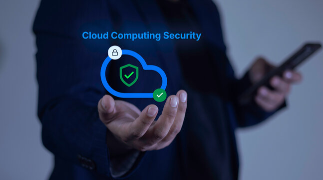 Businessman presenting Cloud Computing Security. Virtual icon shows data protection, a secure cloud, and a shield for cybersecurity.