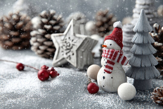 Snowman with Christmas decorations and falling snowflakes creating winter scene - Powered by Adobe