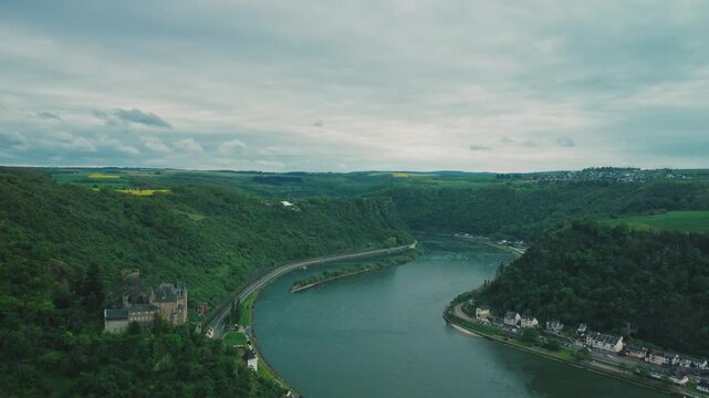 Push aerial shoot of the valley  view with Katz castle in upper middle rhein river during spring in hessen, germany