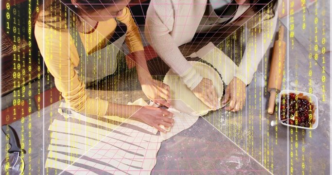 Shaping family duo wearing aprons, mustard top, light sweater pressing dough on counter, AR overlay - Powered by Adobe