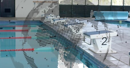 Fototapeta premium Sitting white starting block number 2 on coping beside pool with red lane ropes, copy space