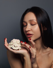 Beauty portrait of a pretty girl with a cake 