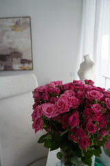 Sewing Workspace with Machine, Overlock and Flowers	, sewing room