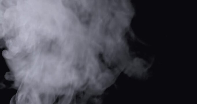 Smoke-like special effects against a black background