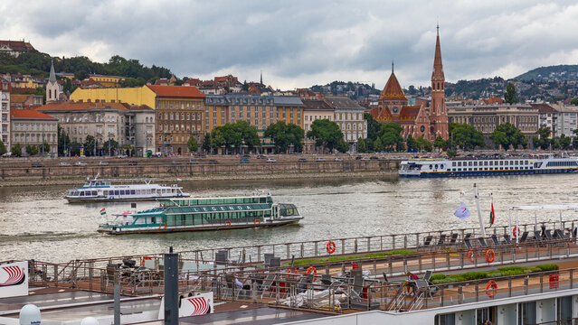 Budapest, Hungary - 7 July , 2025:  Budapest with the Balna (Whale) and the tourist ships moored on the bank of the Danube river