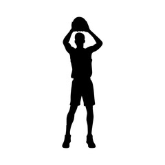 Silhouette of a basketball player in mid jump shooting the ball against a white background