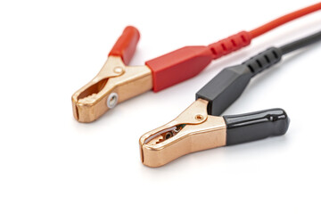 Red and Black Jumper Cable Alligator Clips Isolated on White: Essential Electrical Tools for Car Battery and Circuit Maintenance