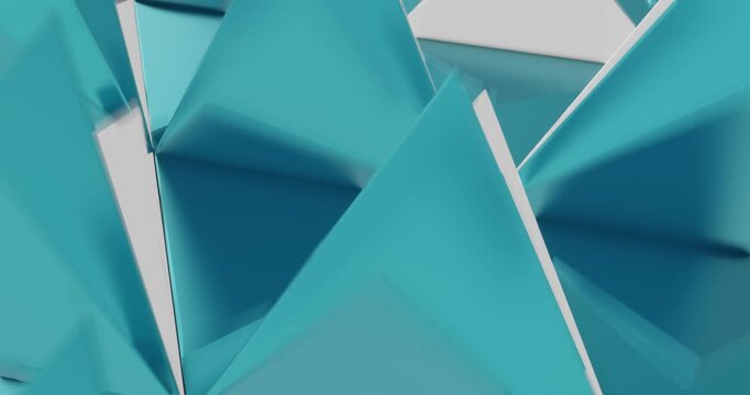 Abstract 3D animation featuring triangular tiles flipping and changing colors. Minimal geometric background with smooth light reflections and seamless looping motion.