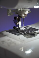 Stylish sewing machine glowing with neon colors