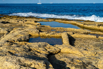 Old ancient salt pans at coast of Malta Marsaskala