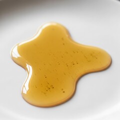 Golden Honey Drip on a White Plate.