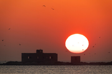 Shrine of Sheikh Ebrahim in Al Shaykh island during sunrise, Bahrain