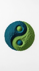 Yin Yang Symbol Made of Vibrant Green and Blue Powders on White Background.