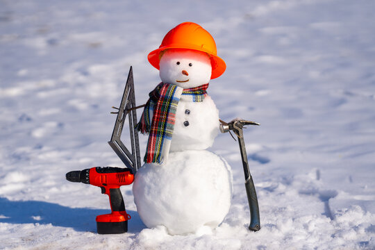 Snowman advert shows winter hardware store gear. Hardware store in winter. Cute snowman advertises seasonal hardware sale.