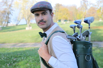 Elegant golfer with a vintage look 
