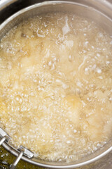 frying in boiling oil