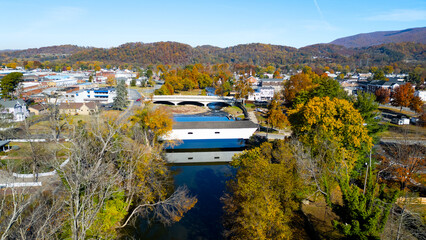 Historic Covered Bridge in small mountain town during the fall 