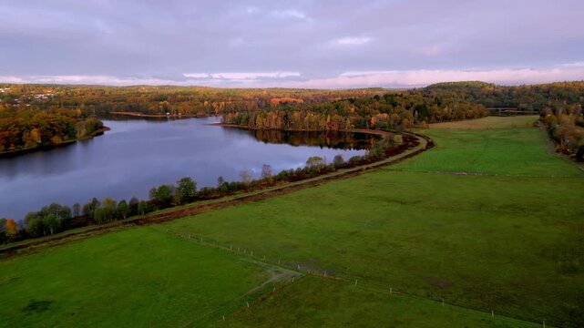 Wide Autumn Panorama of Lake and Country Road near Naas Alings&aring;s, Sweden