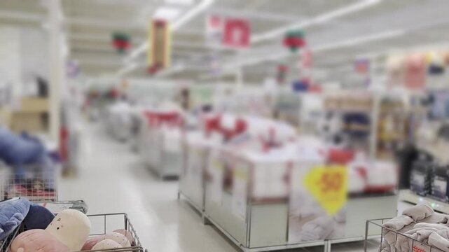 Shoppers navigate a bustling supermarket