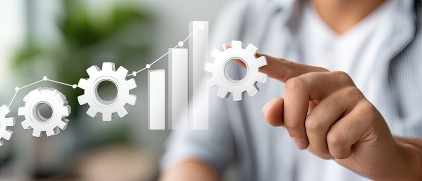 A business professional touches a virtual gear symbolizing technology and innovation in a modern office environment