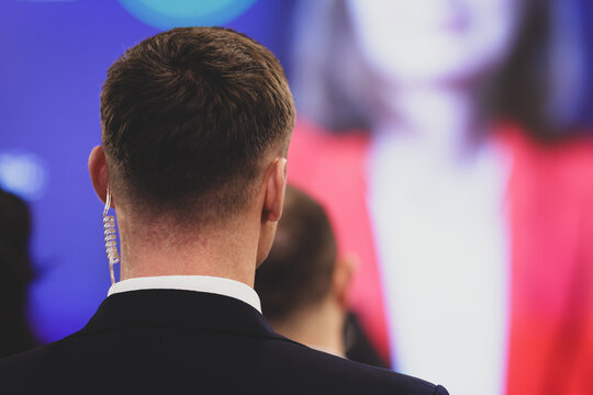 Protection and Guard Service (SPP, Romanian version of the US Secret Service) officers during a public visit of a dignitary - Powered by Adobe