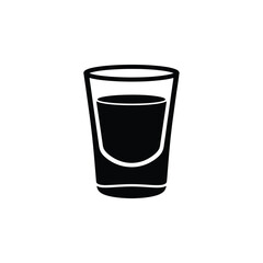 Black silhouette of a shot glass filled with dark liquid © dipu