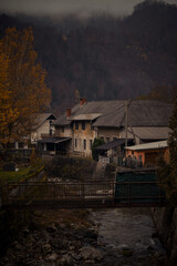 Charming countryside with rustic architecture and calming autumn hues