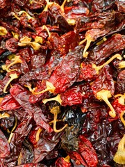 Dried guajillo chilies, used in cooking to enhance and flavor dishes.