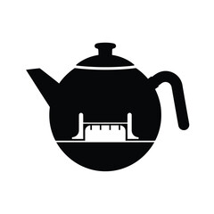 Black teapot on a stand with measuring marks white