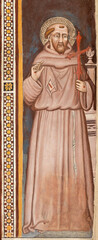 Obraz premium Pistoia - The medieval fresco of St. Francis of Assisi in the church Chiesa di San Francesco by unknown artist