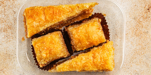 Baklava with pistachios and almonds dessert oriental sweets natural product tasty snack fresh delicious gourmet food background on the table rustic top view copy space
