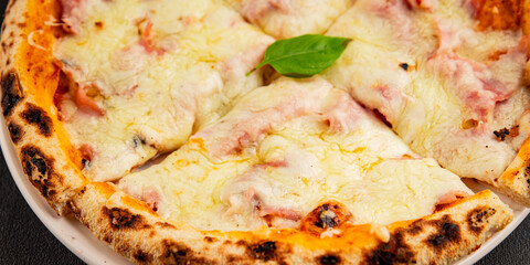 Pizza ham, cheese, tomato sauce fast food natural product tasty snack fresh delicious gourmet food background on the table rustic top view copy space