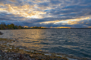 Captivating sunset over St. Lawrence River from Valleyfield, Quebec, showcasing stunning natural beauty and tranquility.